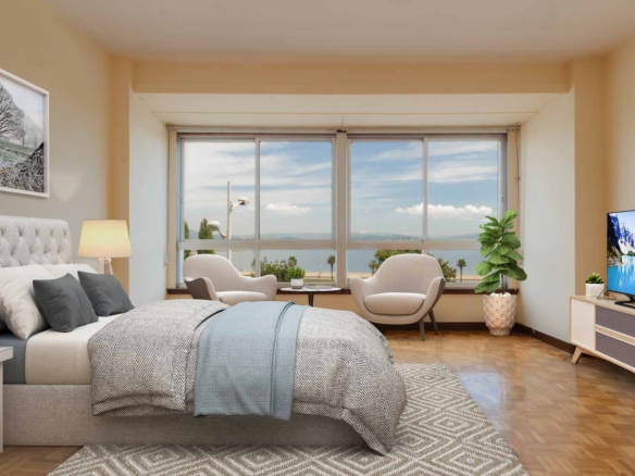 Recreación virtual de dormitorio con vistas al mar